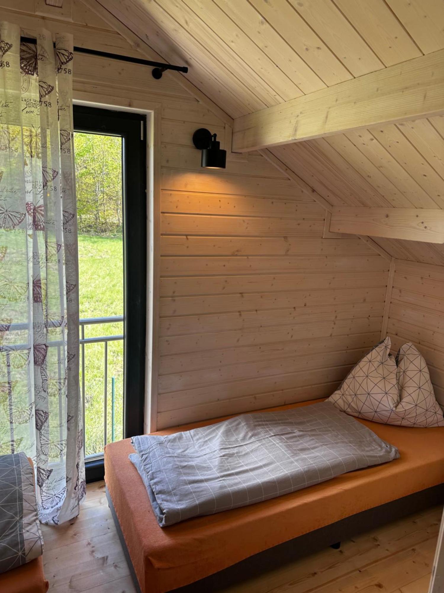 Villa Chatki Nad Wodnym Zakatkiem. à Wapnica  Extérieur photo