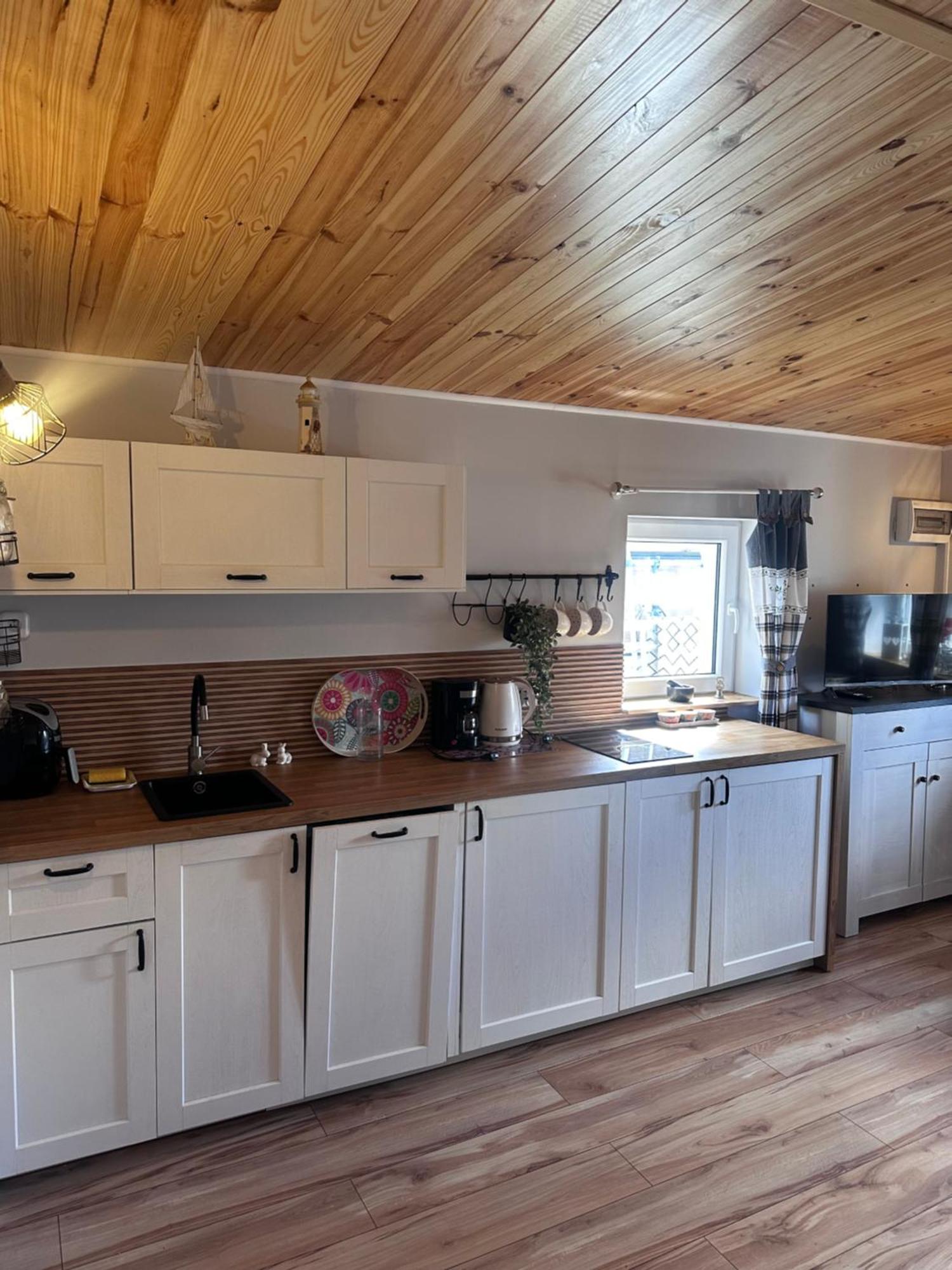 Villa Chatki Nad Wodnym Zakatkiem. à Wapnica  Extérieur photo